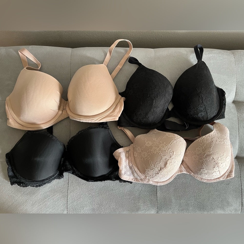 Four (4) Victoria Secret Bras - 2 black, 1 beige, 1 blush. All size 36C.